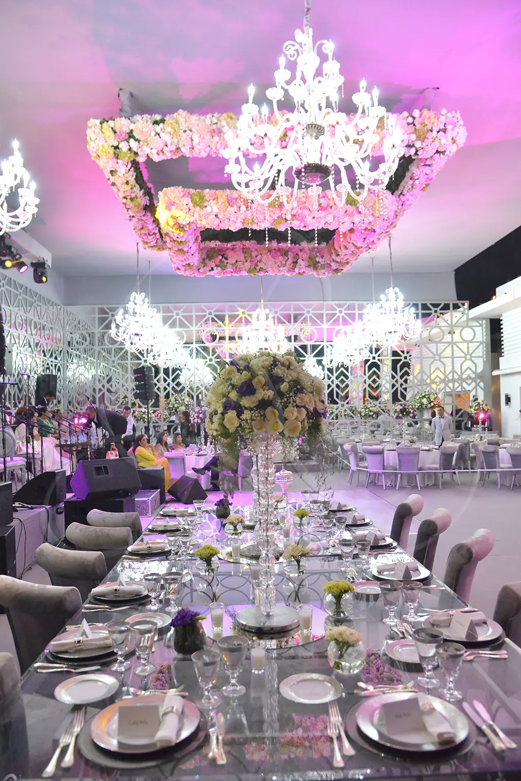 State reception room dressed for a ceremonial dinner, linen-covered tables and crystal chandeliers, Rahal Maître Traiteur